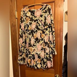 Shear, large floral dress.